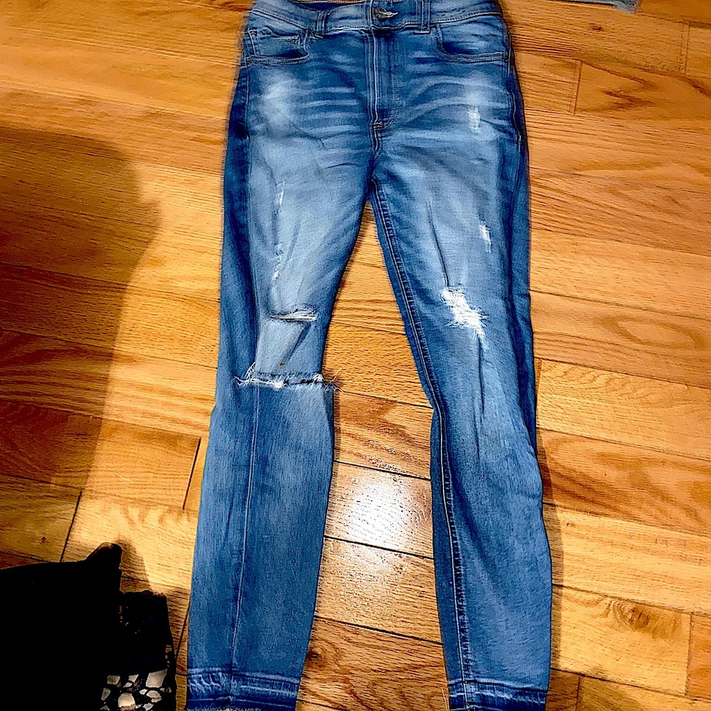 Express ripped blue jeans with frayed ankles